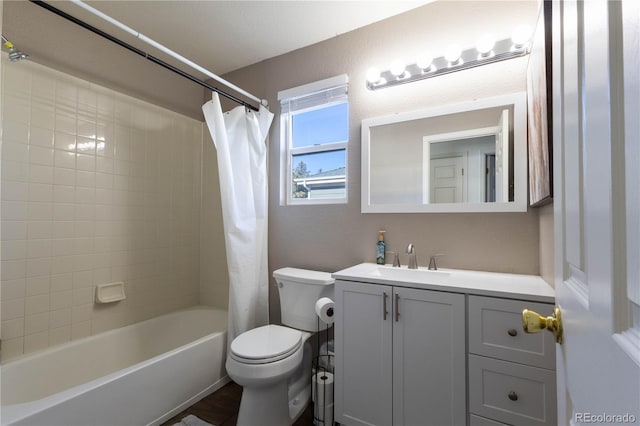 full bath featuring vanity, toilet, and shower / tub combo with curtain