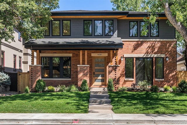 view of front facade featuring a front yard