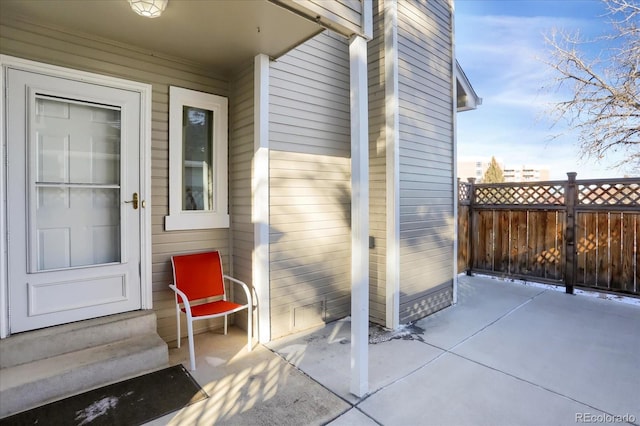 doorway to property with a patio area