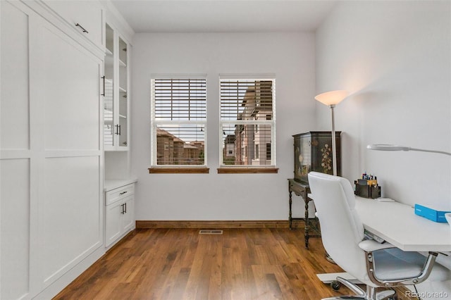 office area with dark hardwood / wood-style floors