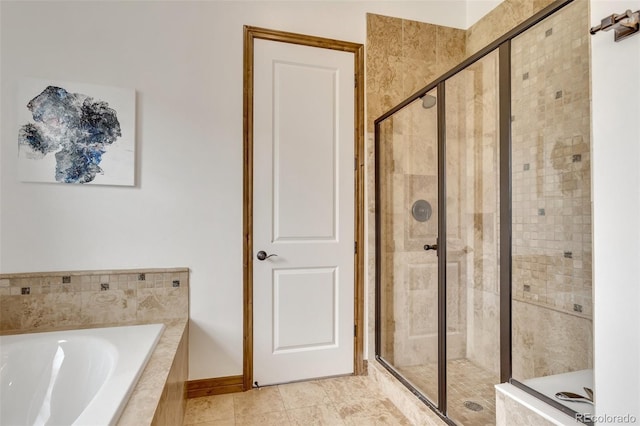 bathroom with tile patterned flooring and plus walk in shower