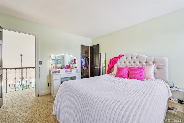 carpeted bedroom featuring a closet