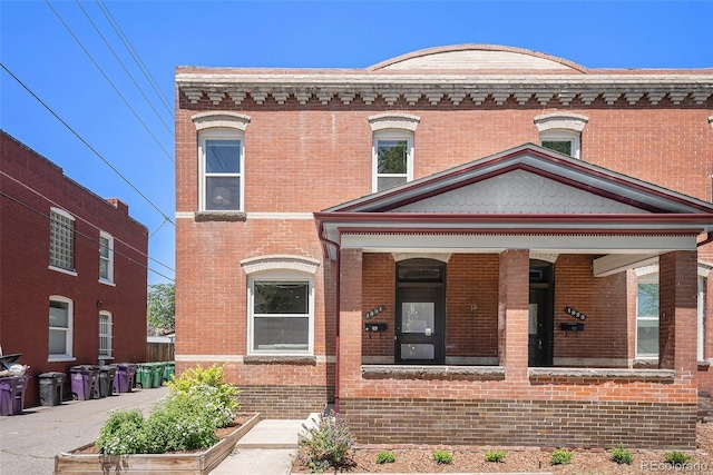 1021 E 23rd Ave, Denver, CO 80205 - view of front facade featuring brick siding