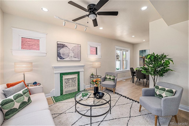 1021 E 23rd Ave, Denver, CO 80205 - living room with wood finished floors, recessed lighting, ceiling fan, and a fireplace