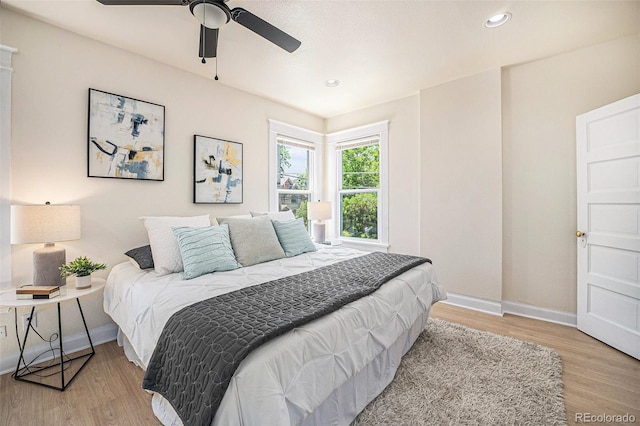 1021 E 23rd Ave, Denver, CO 80205 - bedroom featuring wood finished floors, a ceiling fan, and recessed lighting