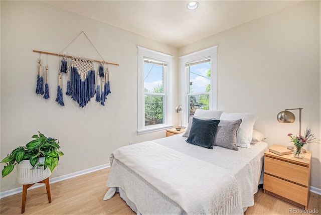 1021 E 23rd Ave, Denver, CO 80205 - bedroom featuring light wood finished floors and recessed lighting