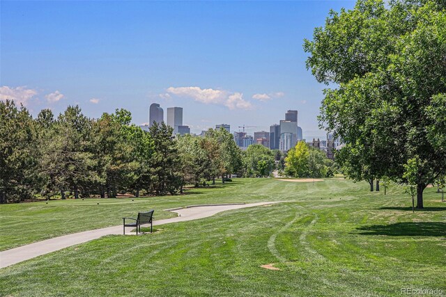 1021 E 23rd Ave, Denver, CO 80205 - view of community featuring a view of skyline and a lawn