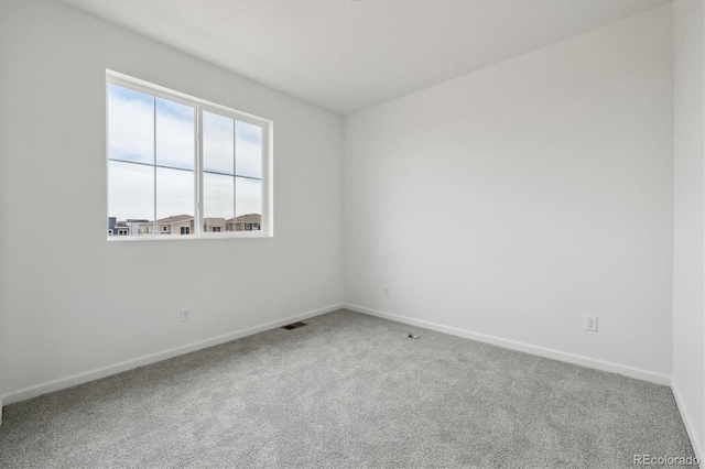 6646 N Nepal St, Aurora, CO 80019 - unfurnished room with carpet and baseboards