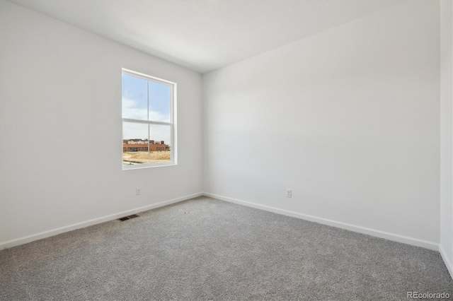 6646 N Nepal St, Aurora, CO 80019 - carpeted spare room featuring baseboards