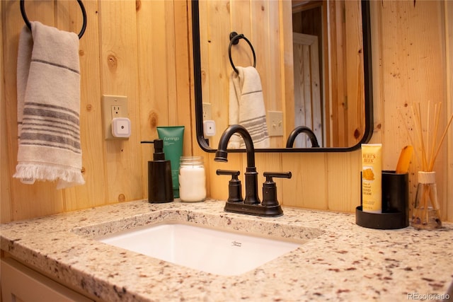 577 Gcr 8952, Granby, CO 80446 - bathroom view of vanity and wooden walls