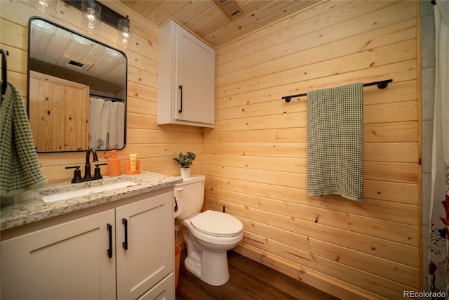 577 Gcr 8952, Granby, CO 80446 - bathroom featuring vanity, wooden ceiling, wood walls, and wood finished floors