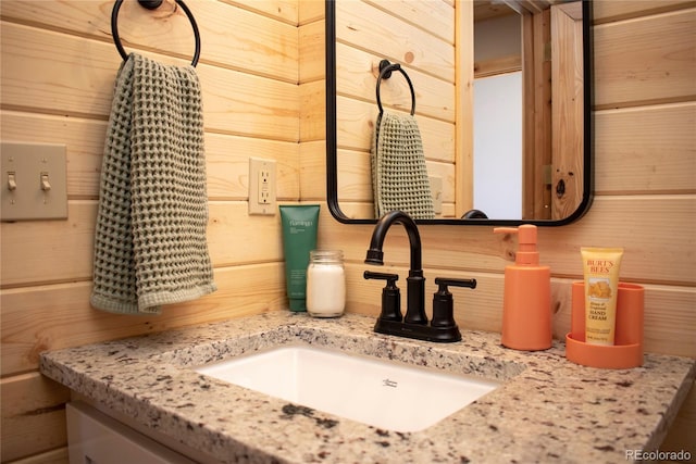 577 Gcr 8952, Granby, CO 80446 - bathroom view of wood walls and vanity