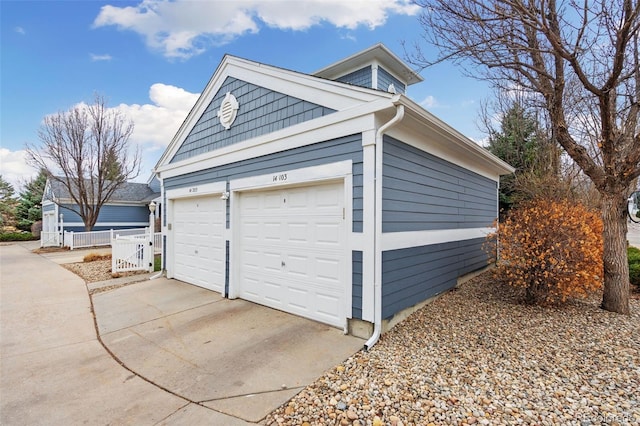 garage with driveway