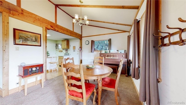 carpeted dining room featuring vaulted ceiling and a chandelier