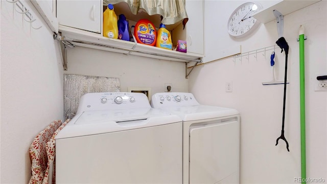 laundry room with separate washer and dryer