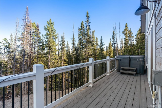 deck with a hot tub