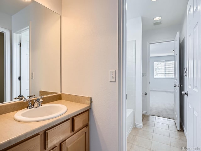 bathroom featuring vanity and tile patterned flooring