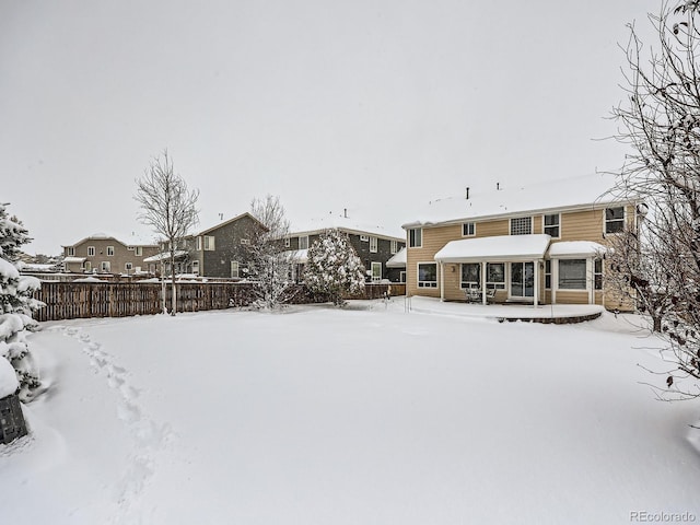 view of snow covered property