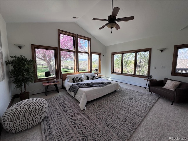 carpeted bedroom featuring high vaulted ceiling, ceiling fan, visible vents, baseboard heating, and baseboards