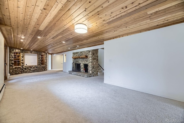 unfurnished living room with a baseboard heating unit, a fireplace, carpet, and wood ceiling