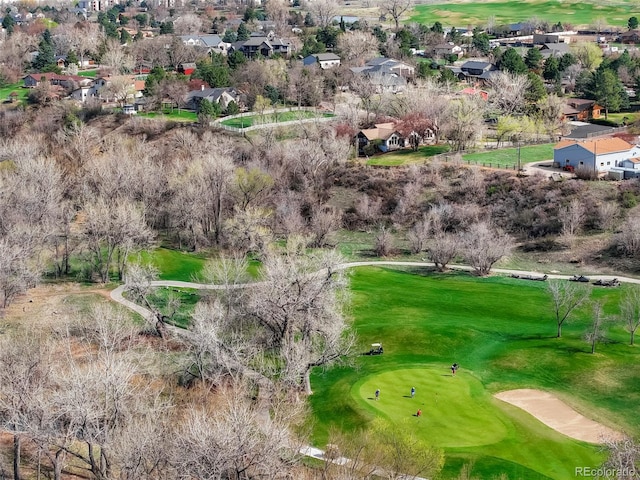 birds eye view of property featuring a residential view and view of golf course