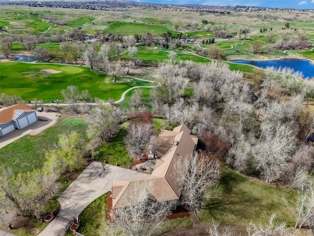 aerial view featuring a water view and view of golf course