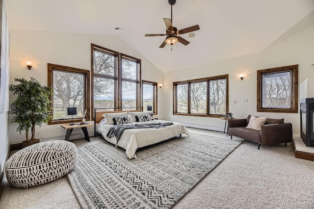 carpeted bedroom featuring high vaulted ceiling, ceiling fan, multiple windows, and visible vents