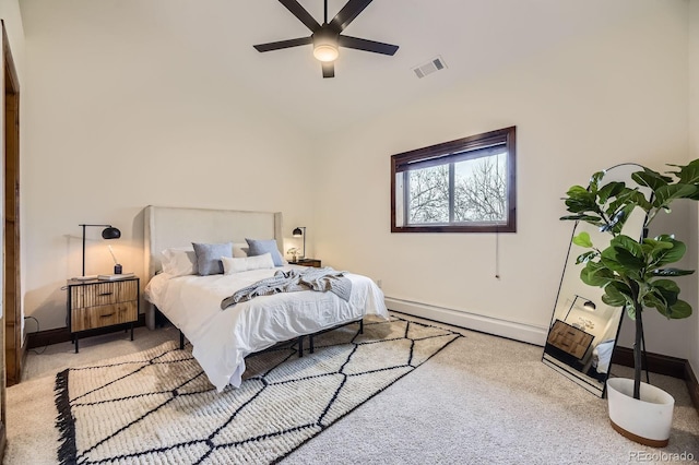 carpeted bedroom featuring ceiling fan, a baseboard heating unit, baseboards, and visible vents