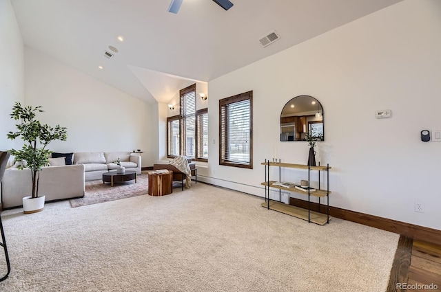 living room featuring high vaulted ceiling, baseboards, a ceiling fan, and visible vents