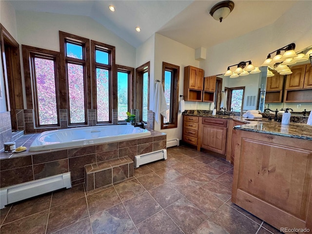 full bath with baseboard heating, a bath, vanity, and vaulted ceiling