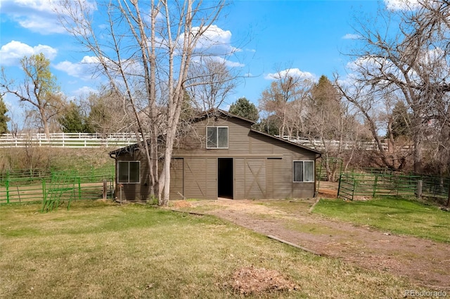 view of barn featuring an exterior structure