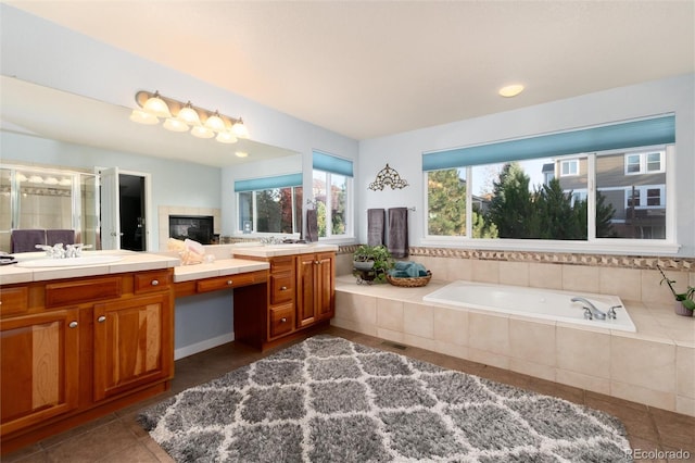 full bathroom featuring visible vents, vanity, a shower stall, tile patterned flooring, and a bath