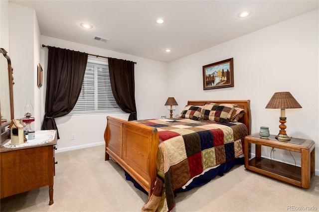 bedroom featuring baseboards, recessed lighting, visible vents, and light colored carpet