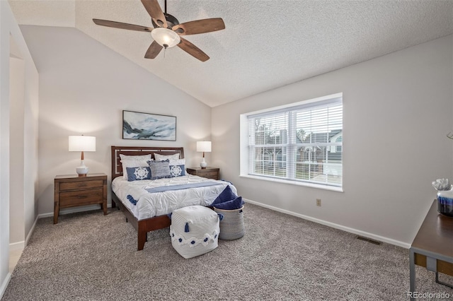 bedroom featuring baseboards, a textured ceiling, visible vents, lofted ceiling, and carpet