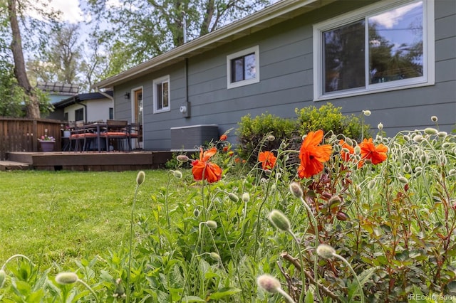 270 31st St, Boulder, CO 80305 - back of property featuring a deck, a yard, and cooling unit