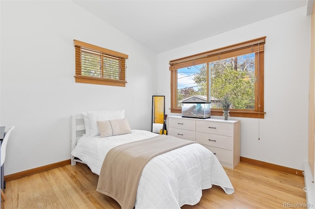 270 31st St, Boulder, CO 80305 - bedroom with vaulted ceiling, light wood-type flooring, and baseboards