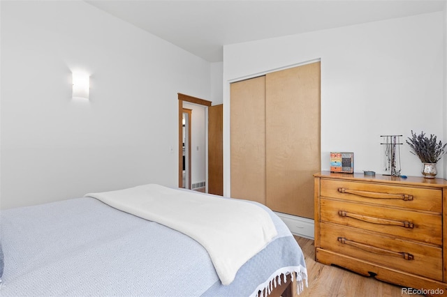 270 31st St, Boulder, CO 80305 - bedroom featuring light wood finished floors and a closet
