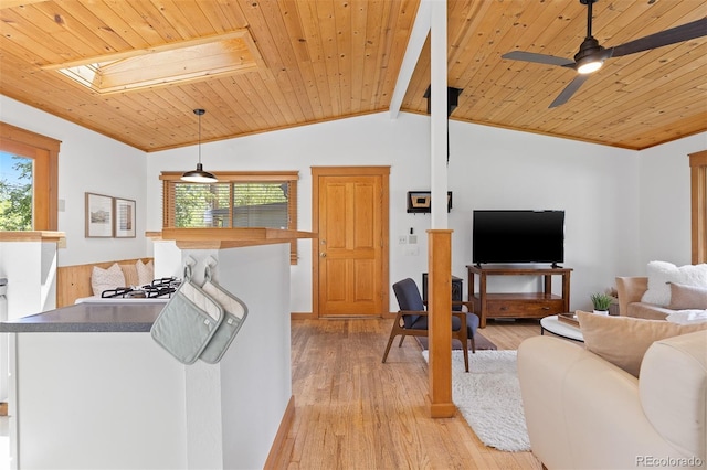 270 31st St, Boulder, CO 80305 - living room with wooden ceiling, plenty of natural light, lofted ceiling, light wood-type flooring, and a skylight