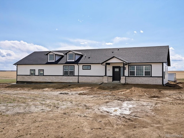 view of front of house with a shingled roof