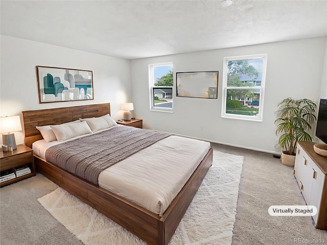 18306 E Gunnison Pl, Aurora, CO 80017 - carpeted bedroom featuring multiple windows