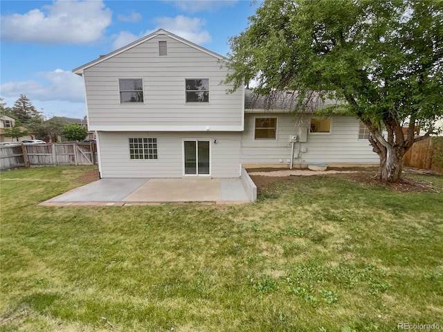 18306 E Gunnison Pl, Aurora, CO 80017 - rear view of house with a patio area and a fenced backyard