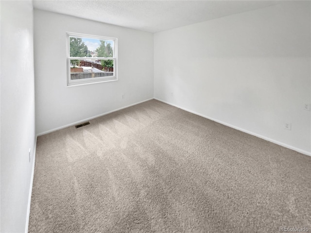 18306 E Gunnison Pl, Aurora, CO 80017 - carpeted empty room featuring baseboards