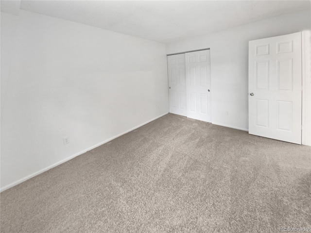 18306 E Gunnison Pl, Aurora, CO 80017 - unfurnished bedroom featuring carpet floors and a closet
