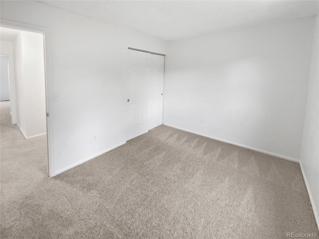 18306 E Gunnison Pl, Aurora, CO 80017 - carpeted spare room with baseboards