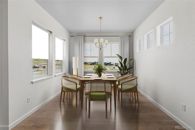 dining room featuring dark hardwood / wood-style flooring and a notable chandelier