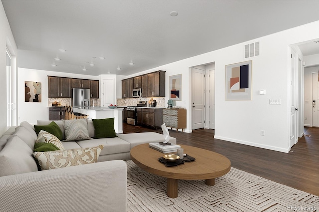 living room with wood-type flooring