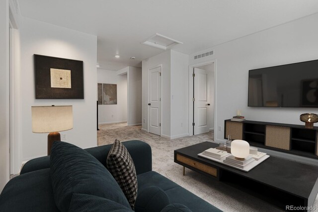 living room featuring light colored carpet