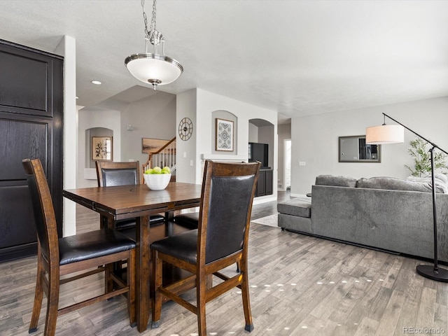 dining room featuring wood-type flooring