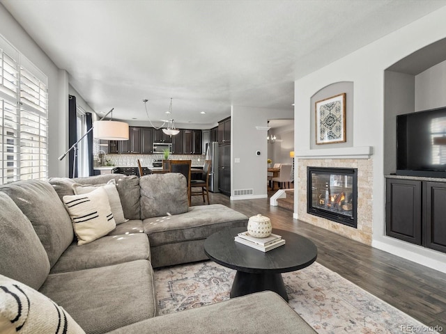 living room featuring dark hardwood / wood-style flooring