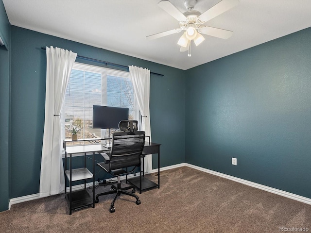 office area featuring carpet floors and ceiling fan